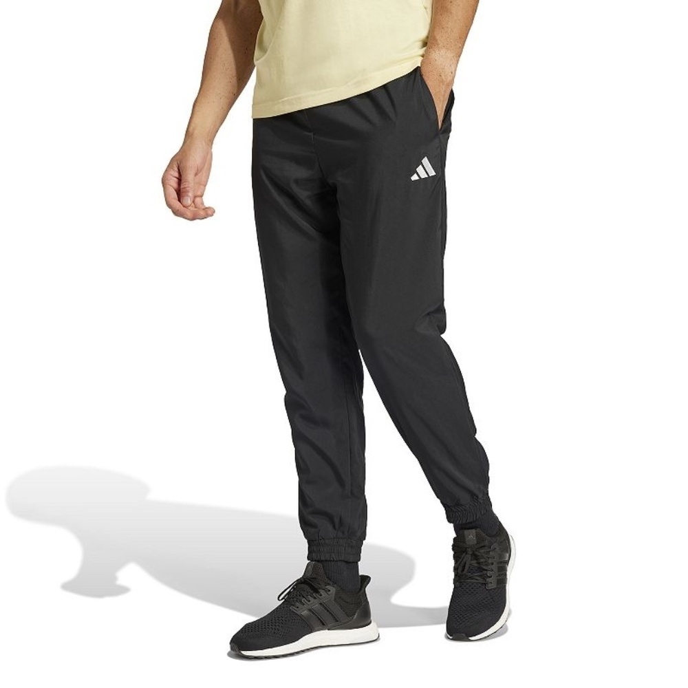 Adidas Men’s Essentials Sportswear Track Pants in Black
